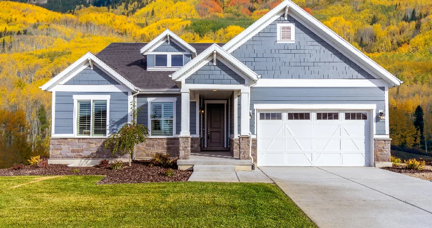 A beautiful house with a new garage door