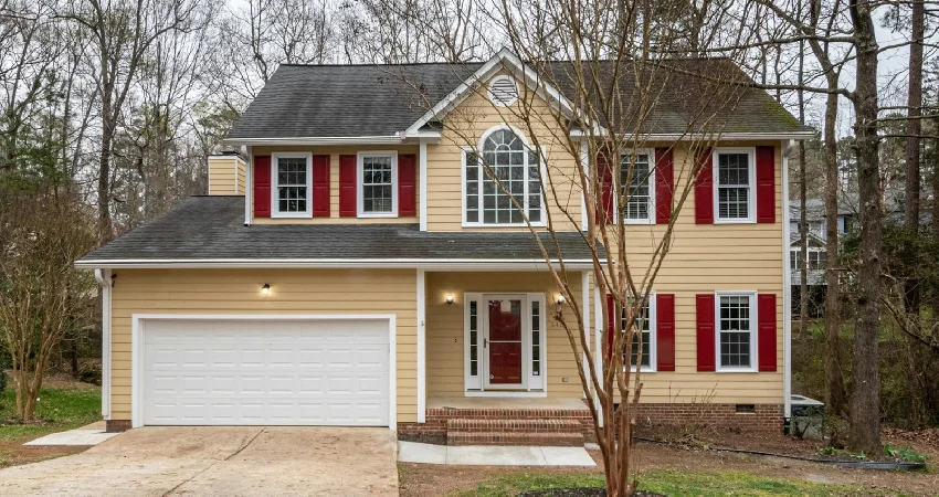 A beautiful house with a white garage door