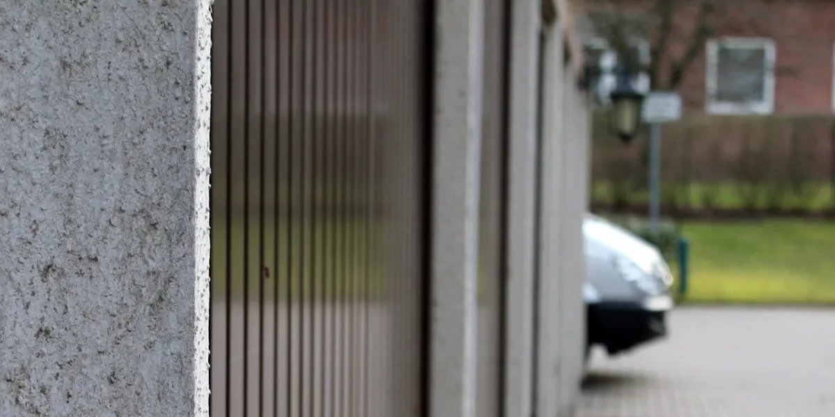Make sure no objects are obstructing the garage door sensors