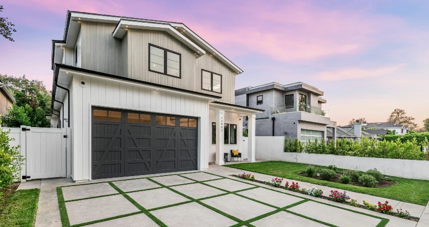 Wide garage double door and concrete driveway