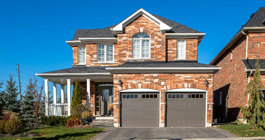 a garage door on a brick building