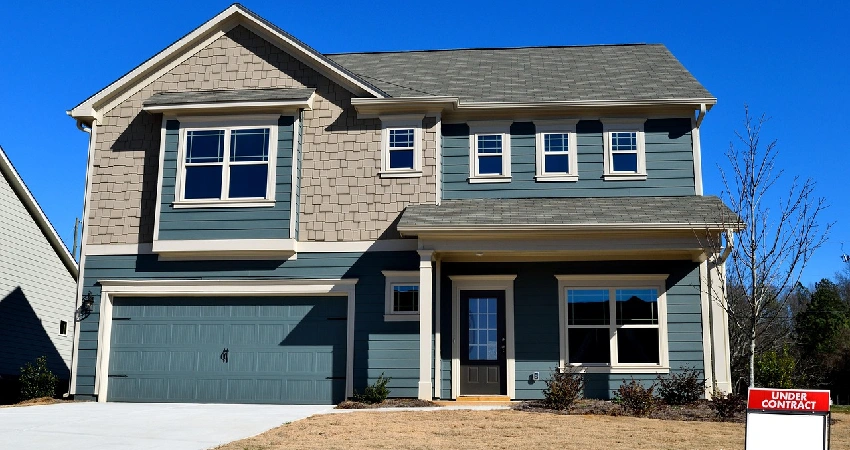 double story house with insulated garage door