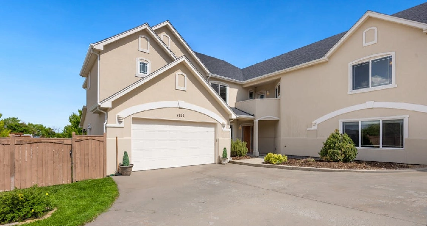enhance curb appeal with low-care wood garage doors