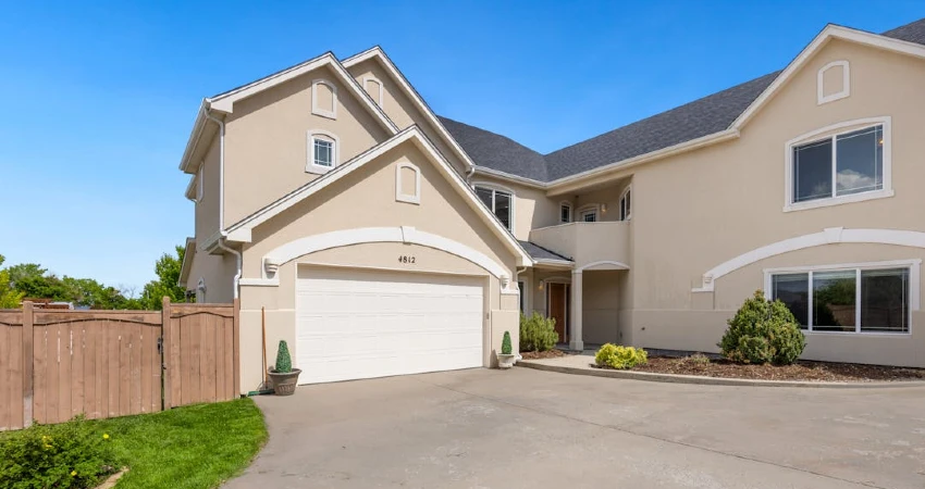 home exterior with a double garage entrance
