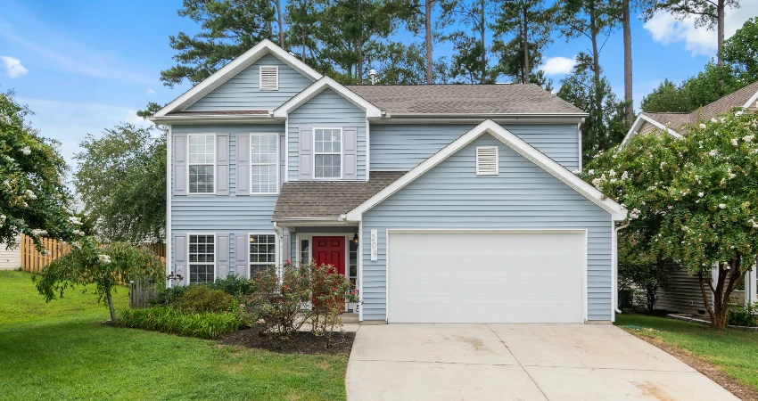 house with white, blue, and red exterior colors